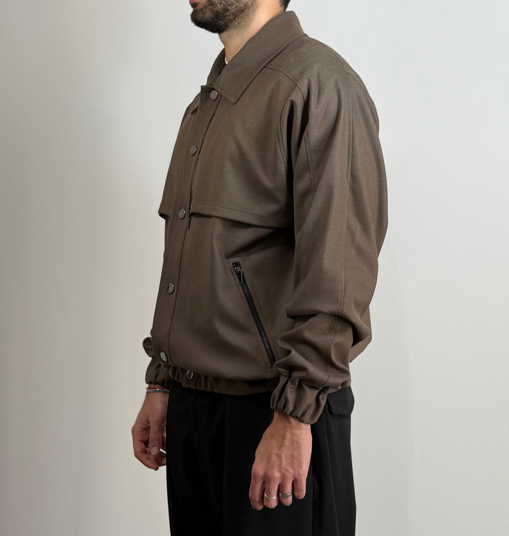 Giubbotto Gavroche con bottoni a pressione e zip con dettagli