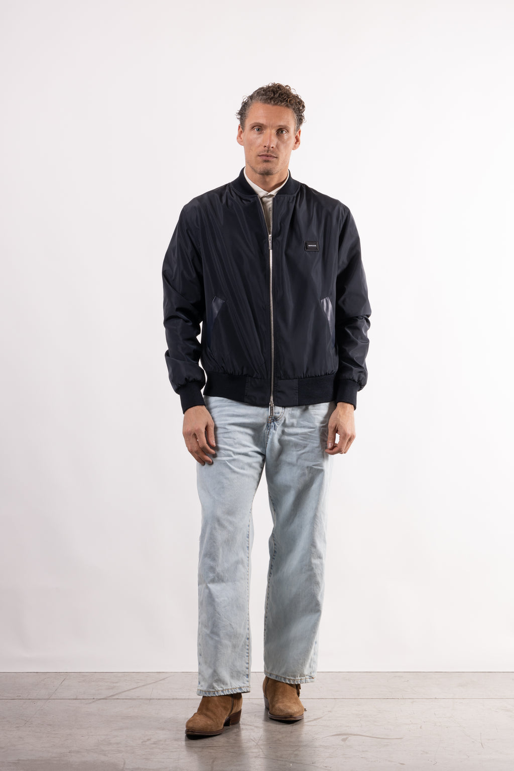 Bomber tecnico con placchetta lato cuore