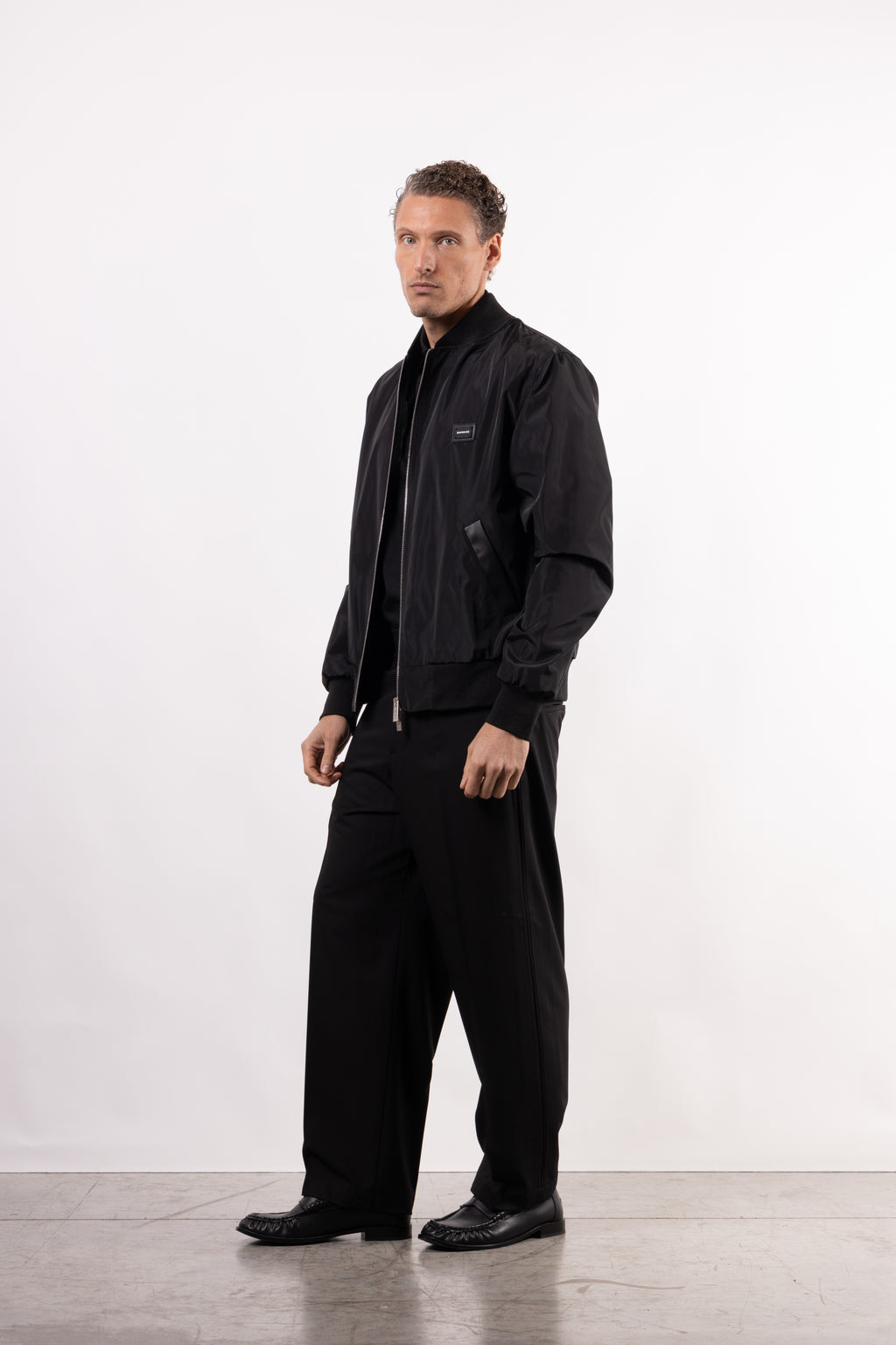 Bomber tecnico con placchetta lato cuore