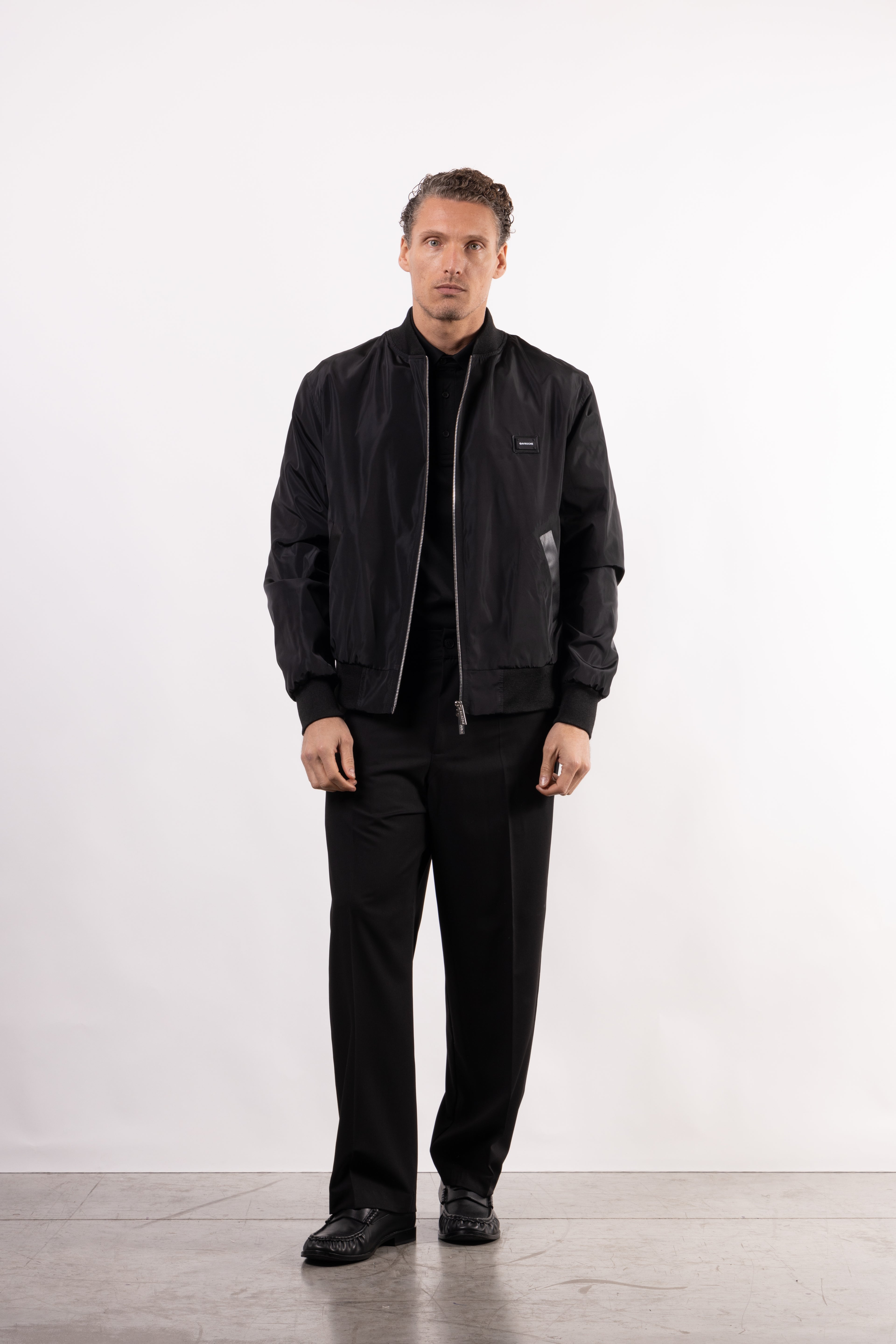 Bomber tecnico con placchetta lato cuore