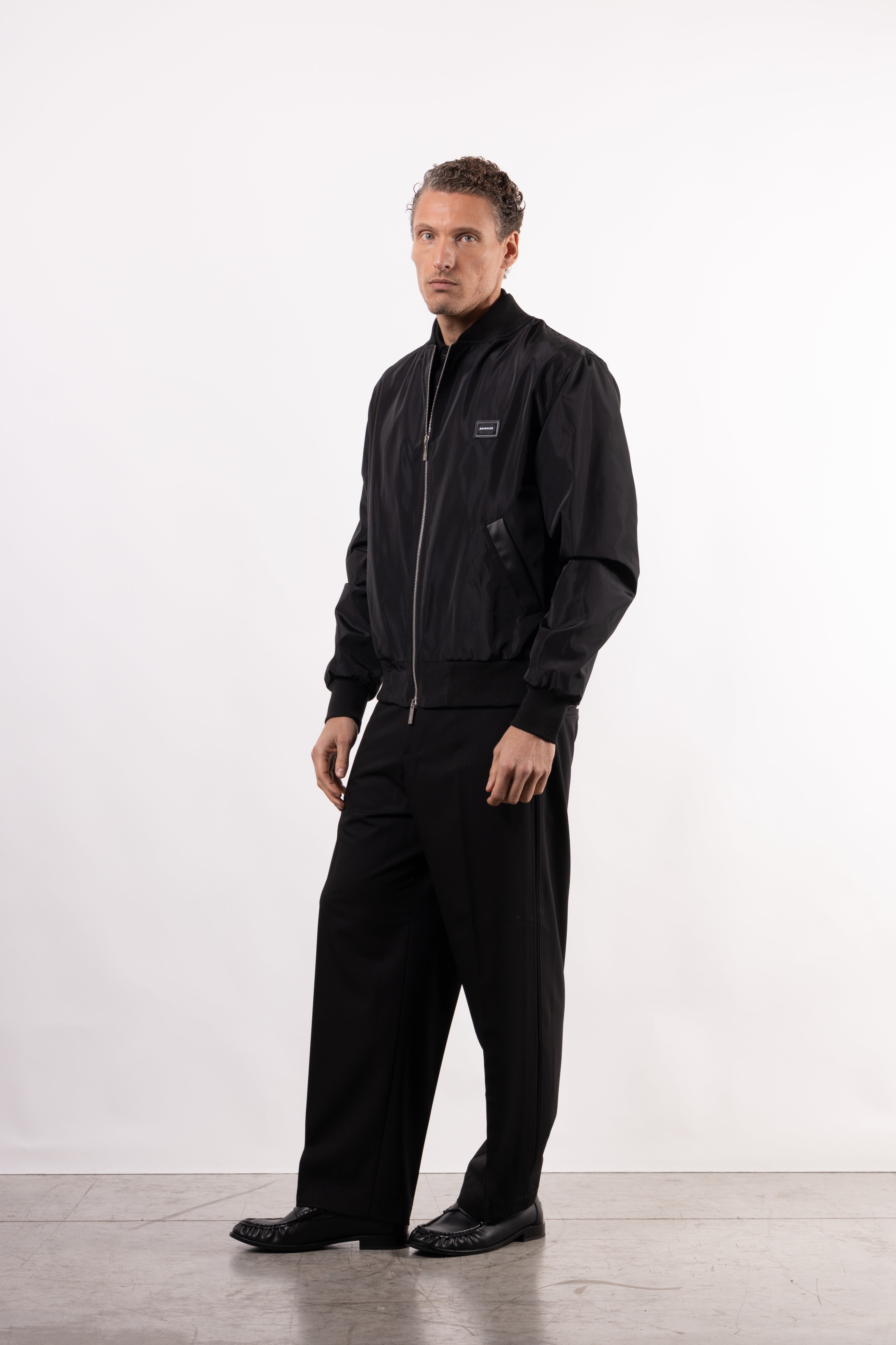 Bomber tecnico con placchetta lato cuore