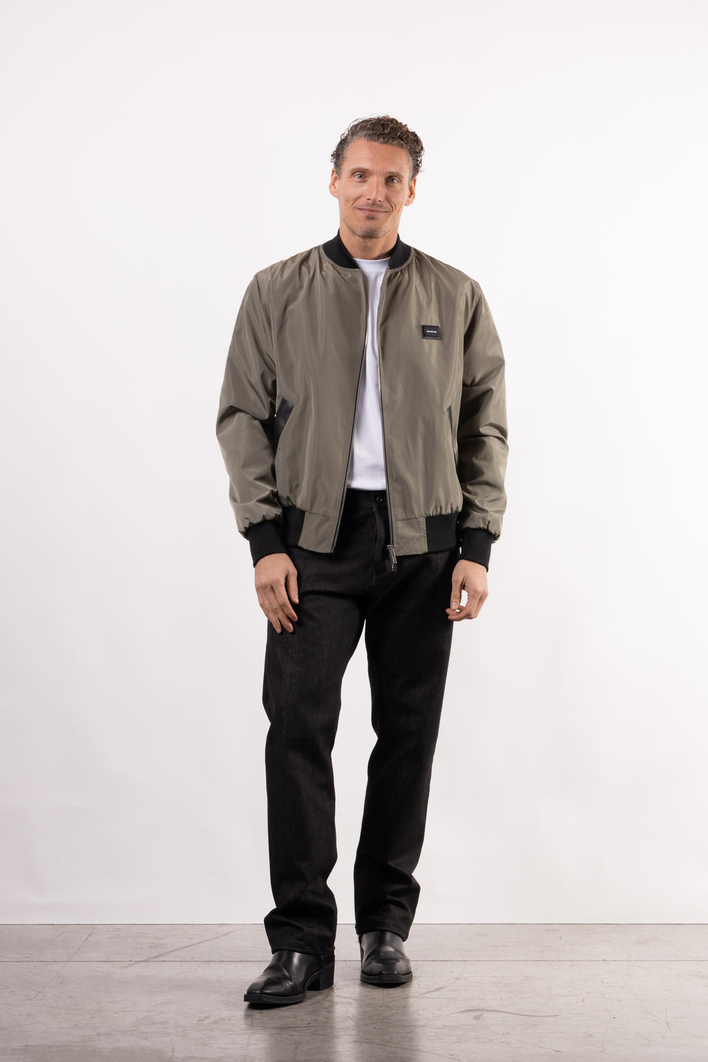 Bomber tecnico con placchetta lato cuore