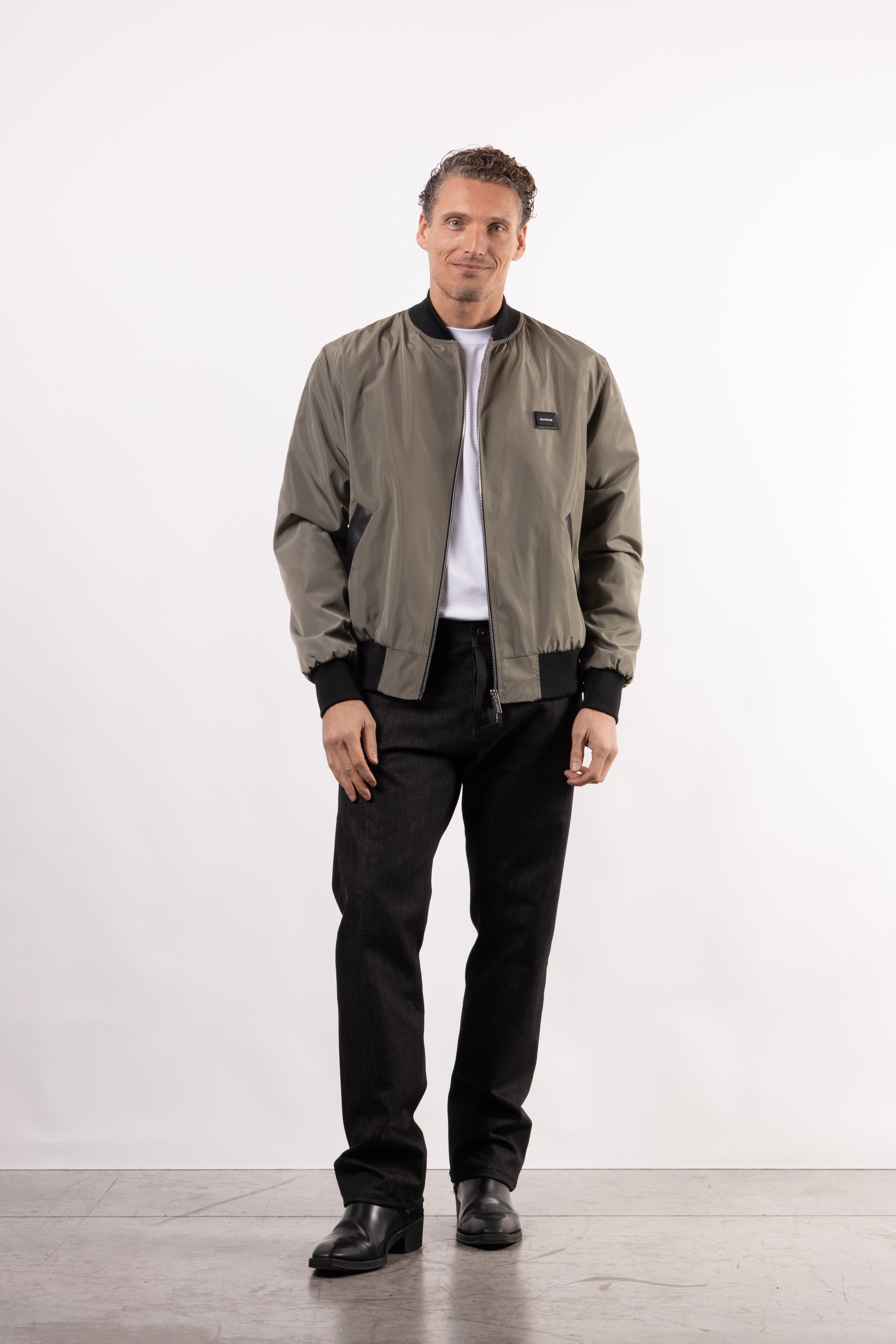 Bomber tecnico con placchetta lato cuore
