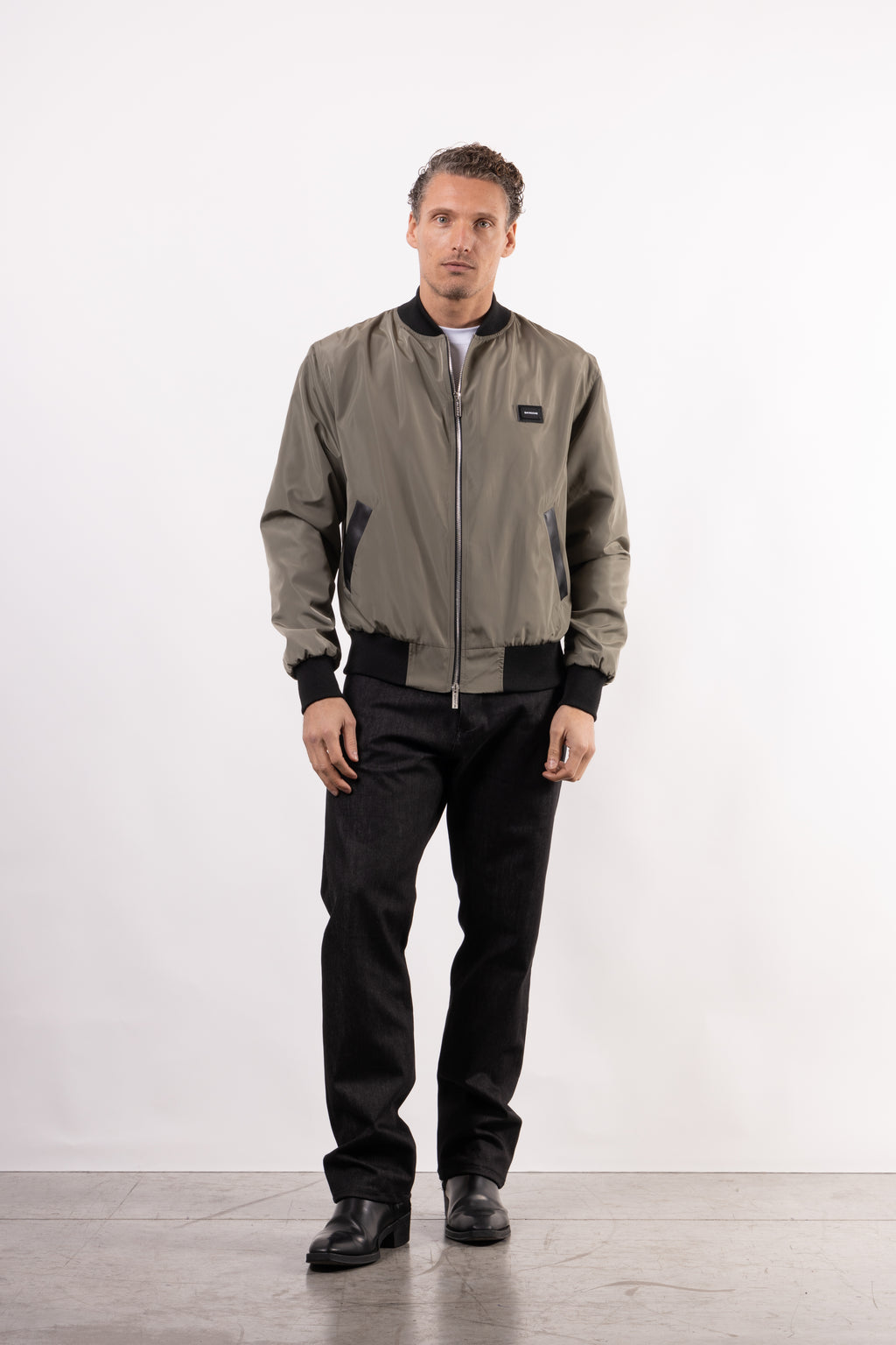 Bomber tecnico con placchetta lato cuore