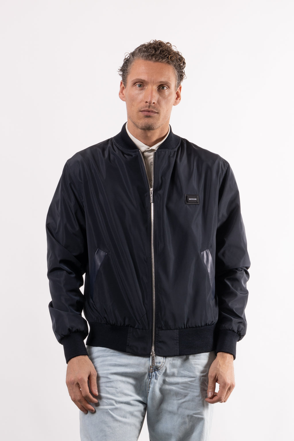 Bomber tecnico con placchetta lato cuore