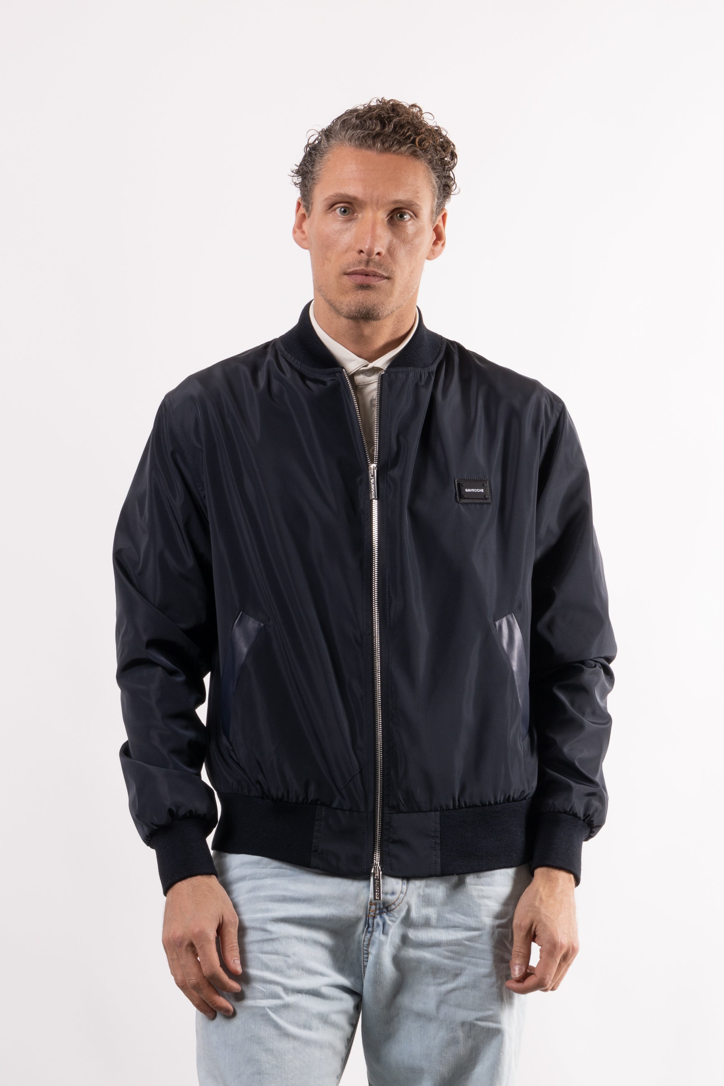 Bomber tecnico con placchetta lato cuore