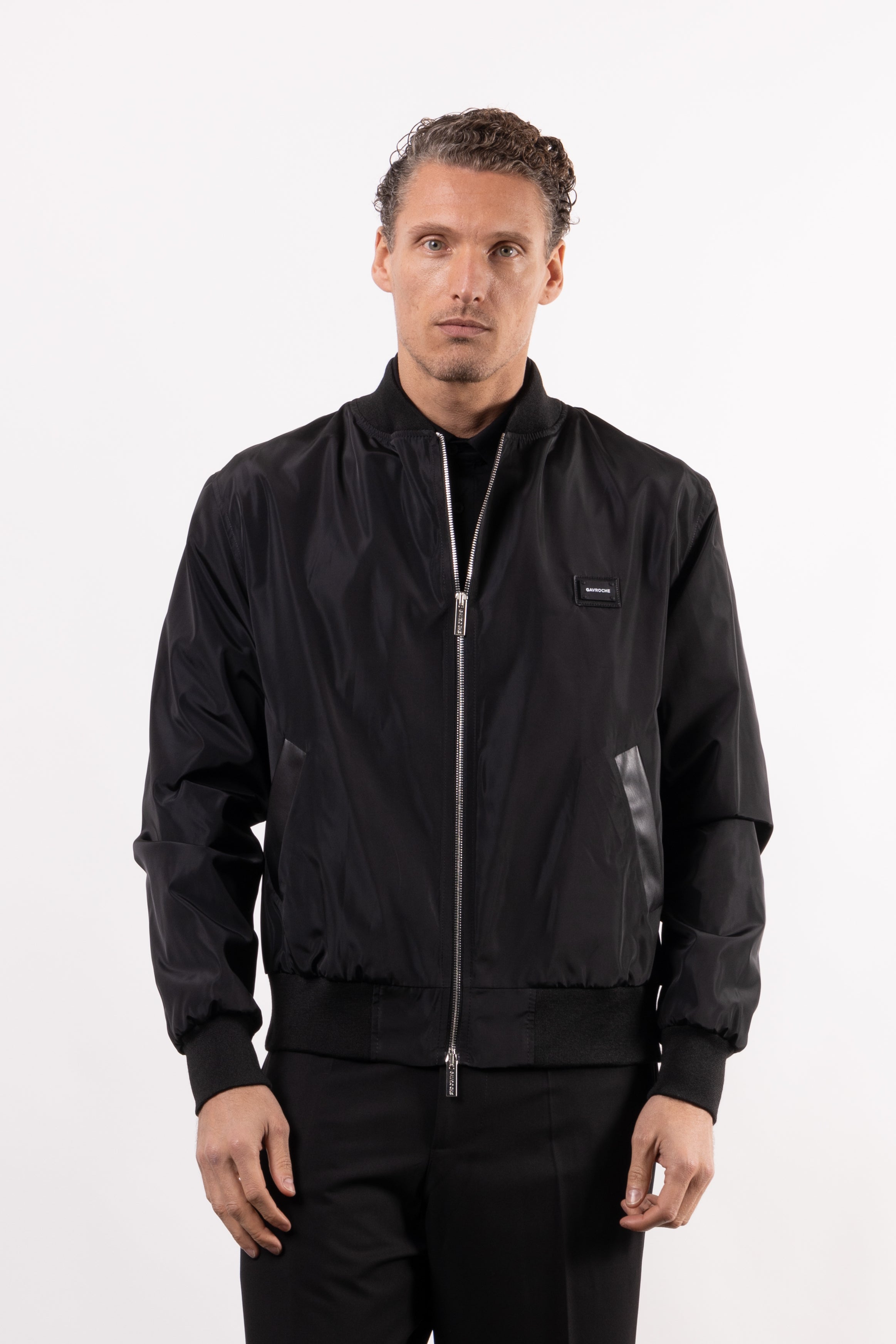 Bomber tecnico con placchetta lato cuore