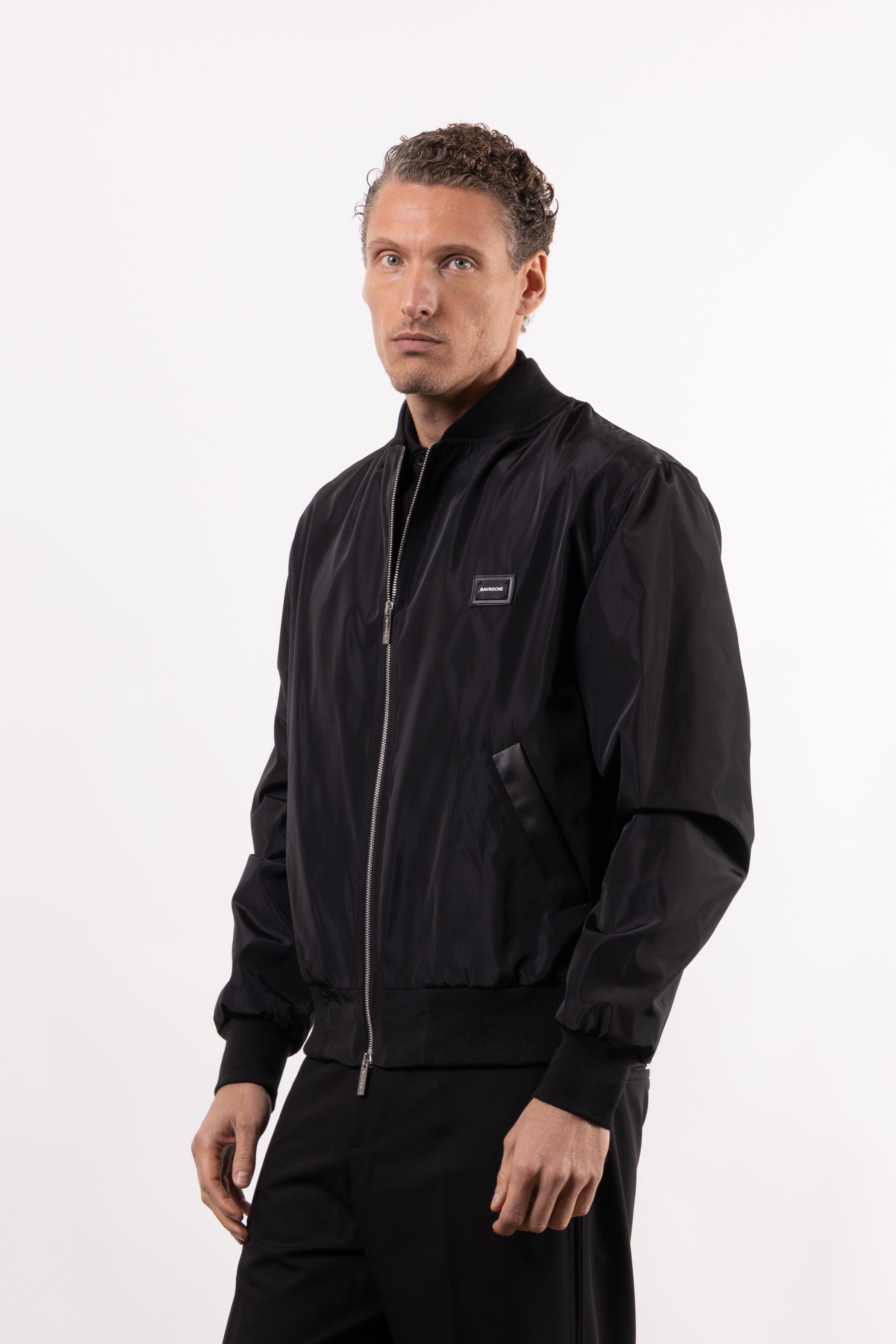 Bomber tecnico con placchetta lato cuore