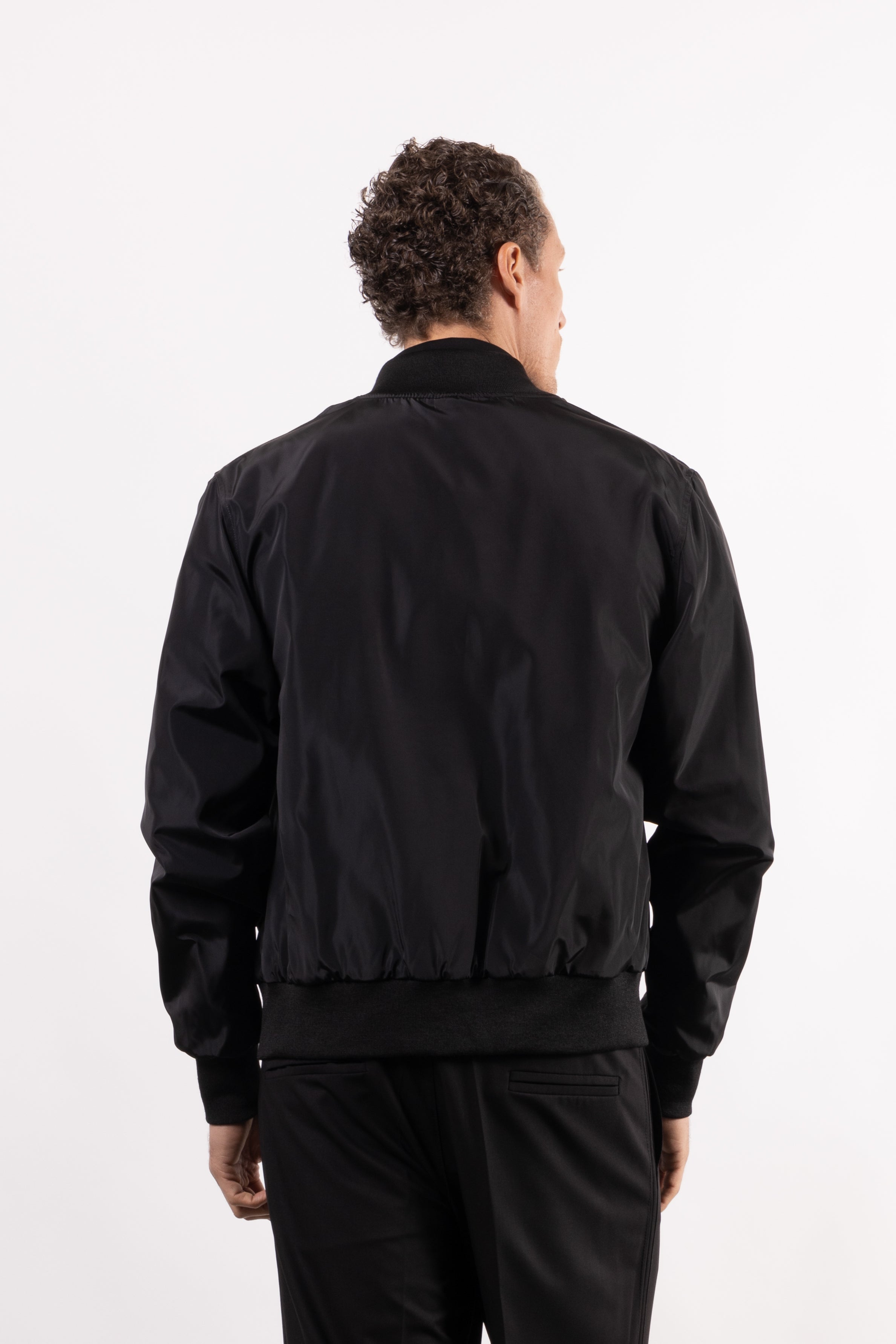 Bomber tecnico con placchetta lato cuore