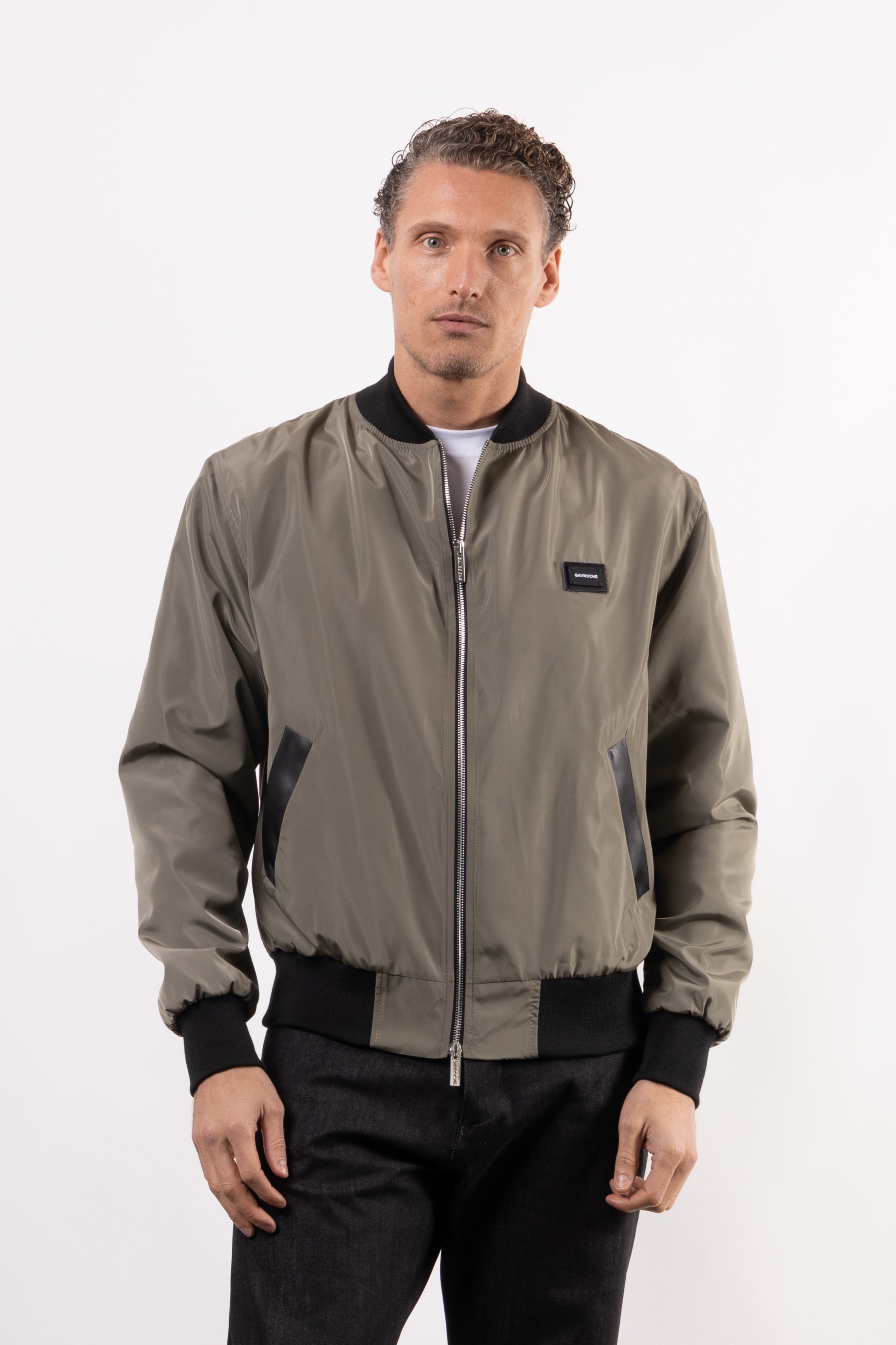 Bomber tecnico con placchetta lato cuore