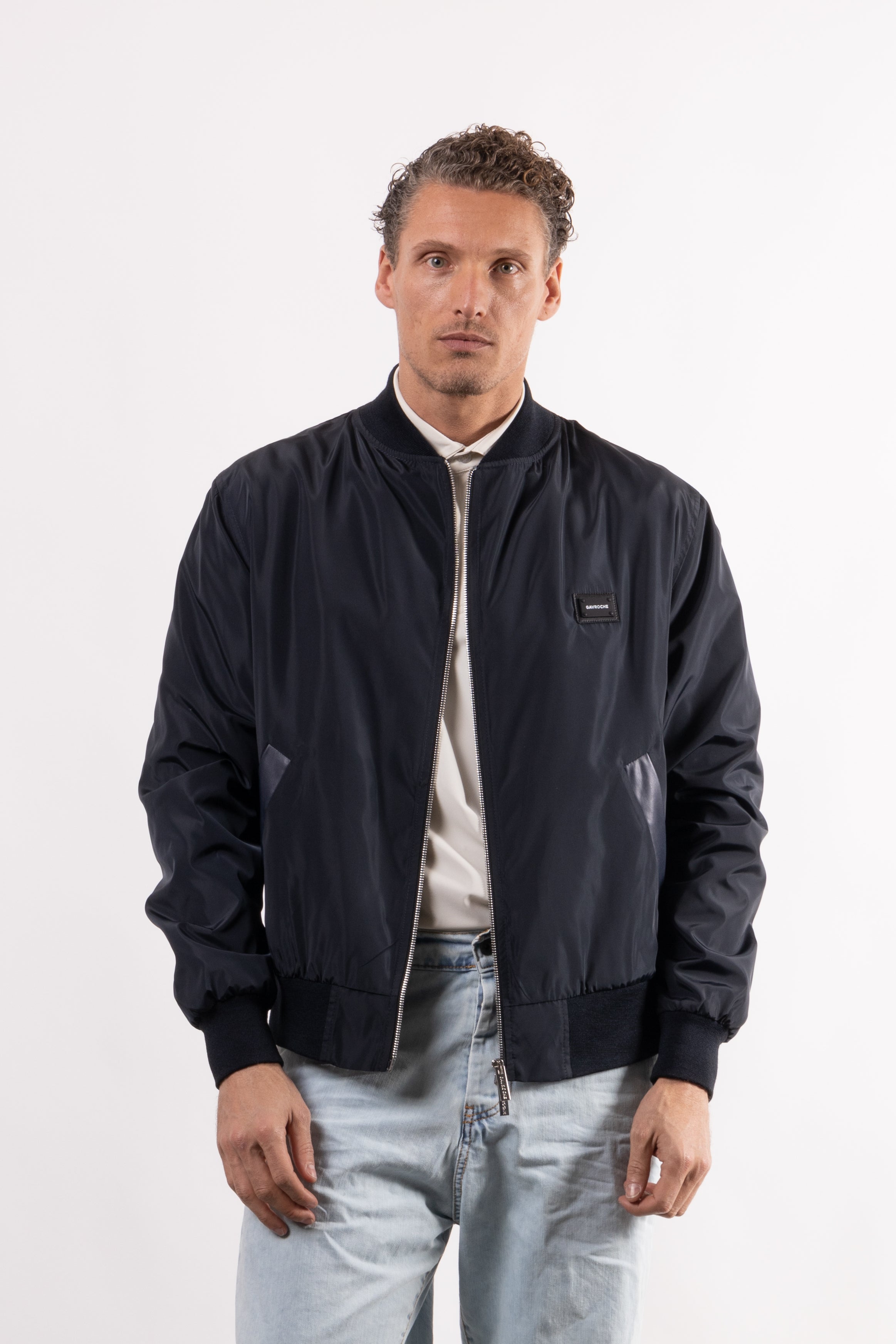 Bomber tecnico con placchetta lato cuore