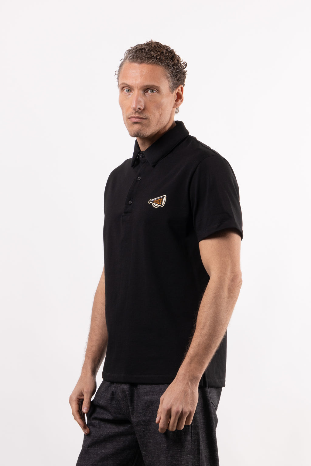 Polo in cotone con patch lato cuore