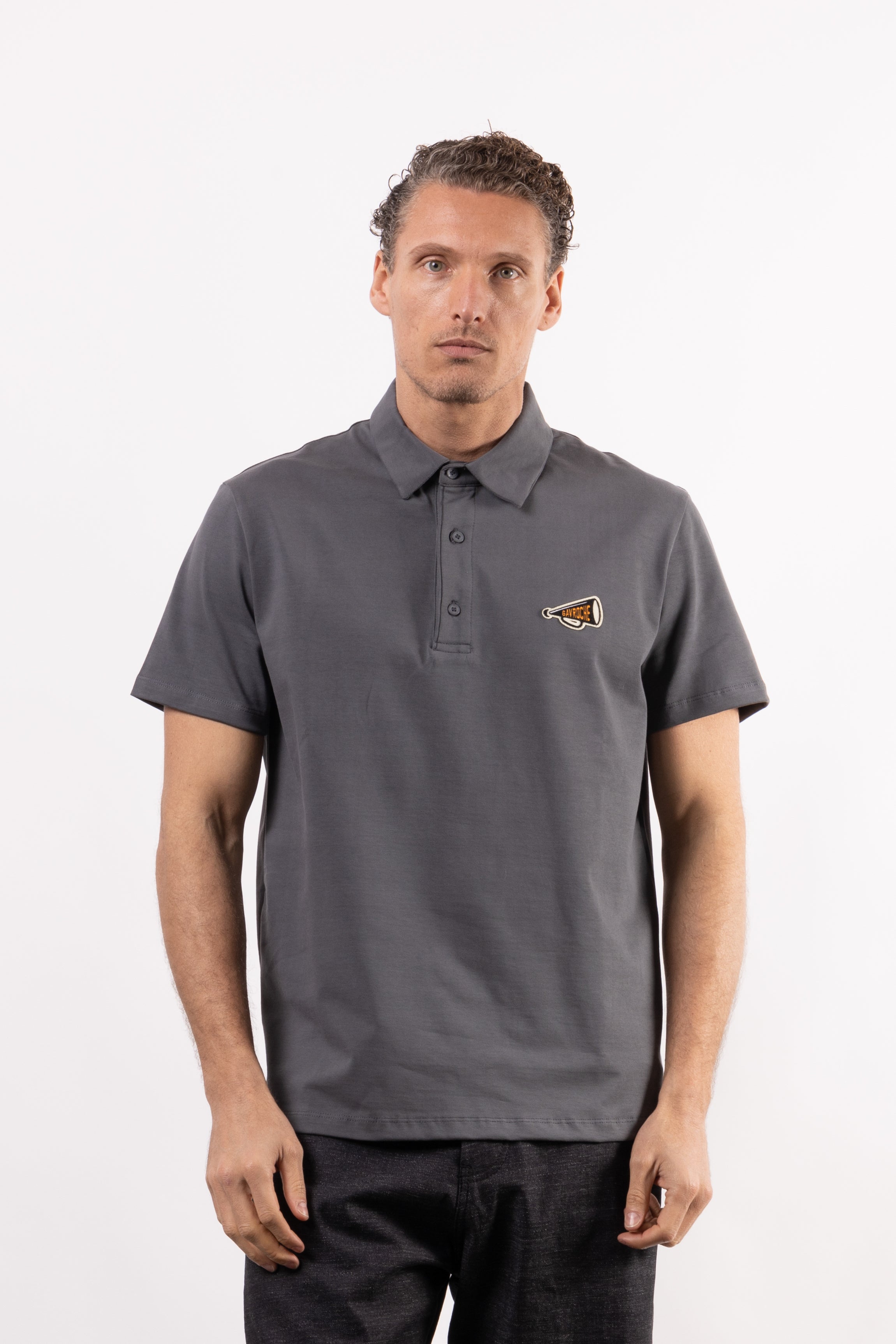 Polo in cotone con patch lato cuore