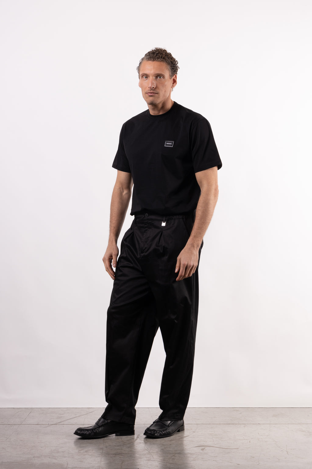 Pantalone in cotone con pence