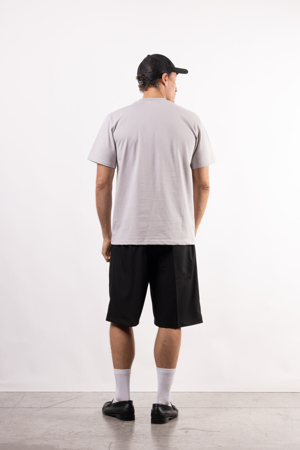 T-shirt in 100% cotone con placchetta in pelle lato cuore