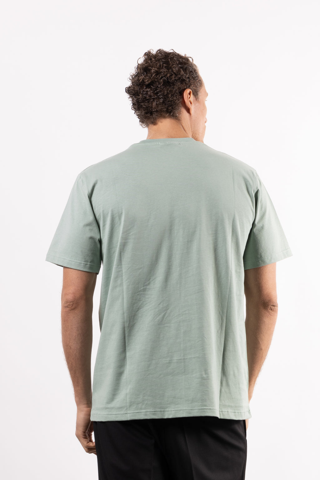 T-shirt in 100% cotone con placchetta in pelle lato cuore