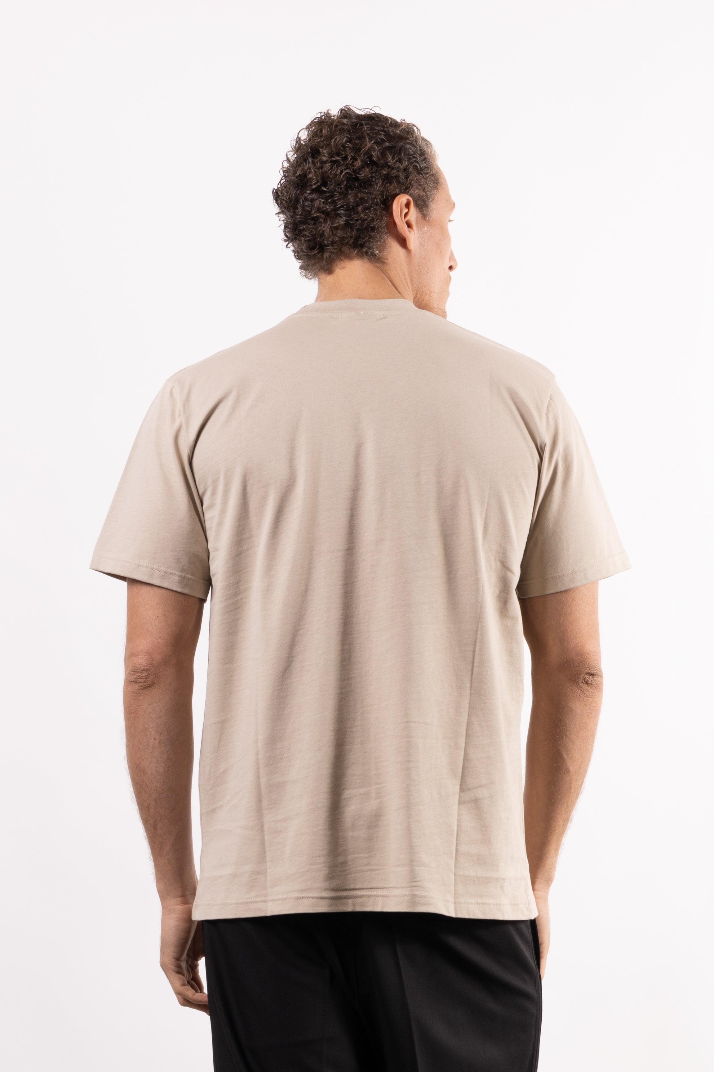 T-shirt in 100% cotone con placchetta in pelle lato cuore